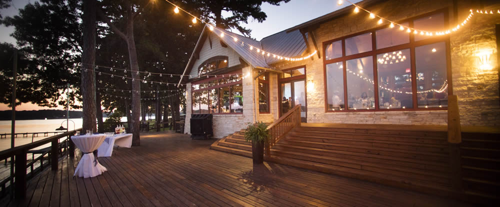 Festive nightime view of the Petroleum Club at Lake tyler in Texas